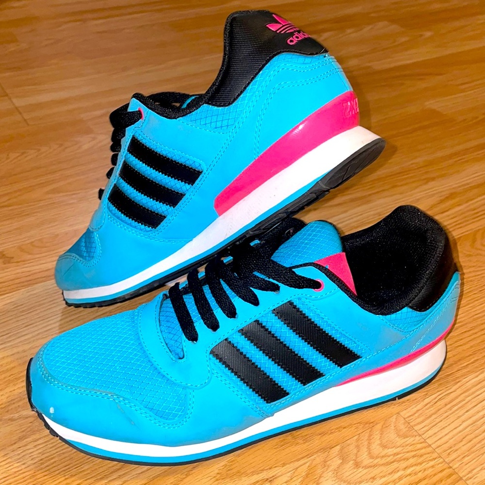 Baby blue and pink retro vintage adidas sneakers.  Size 10